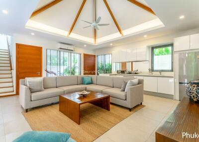 Spacious and bright living room with modern kitchen