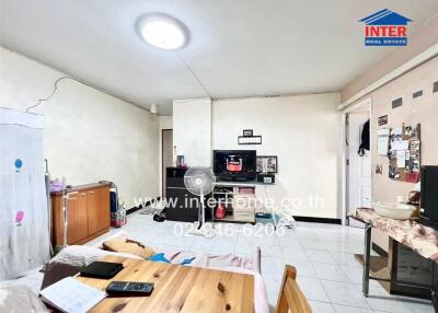 Living room with furniture and appliances