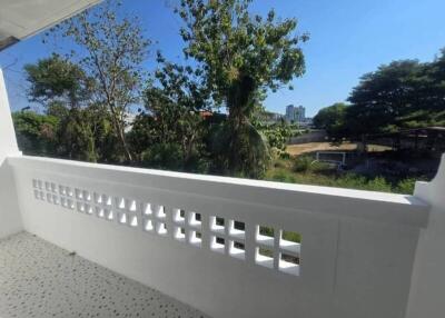 Apartment balcony with view of greenery