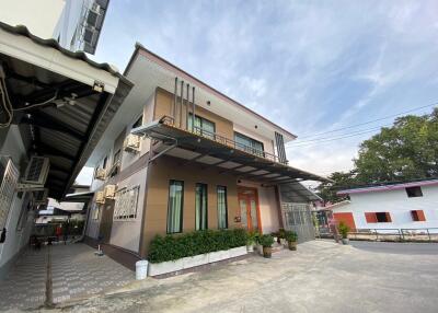 Modern two-story house with a carport