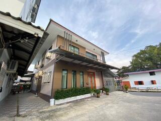 Modern two-story house with a carport