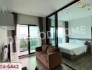 Modern bedroom with glass partition and balcony view