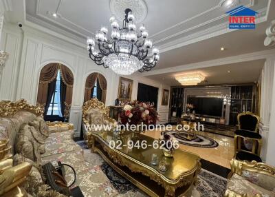 Luxury living room with ornate decor and chandelier