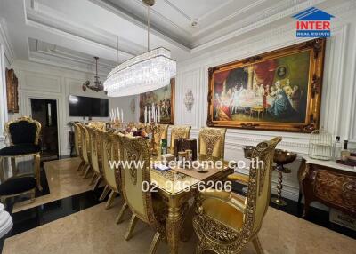 Luxury dining room with ornate furniture and chandelier