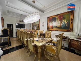 Luxury dining room with ornate furniture and chandelier