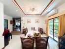 Spacious dining room with modern lighting and large windows