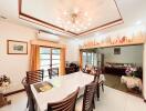 Spacious dining room with a table, chairs, and decorative elements