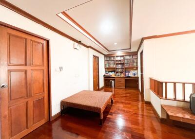 Spacious living room with wooden furniture