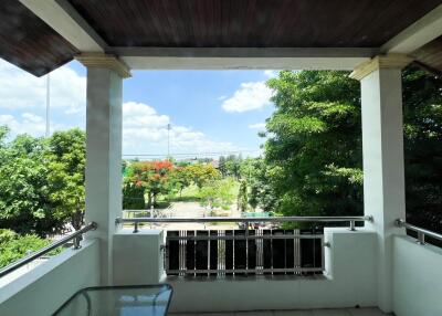 Spacious balcony with scenic garden views