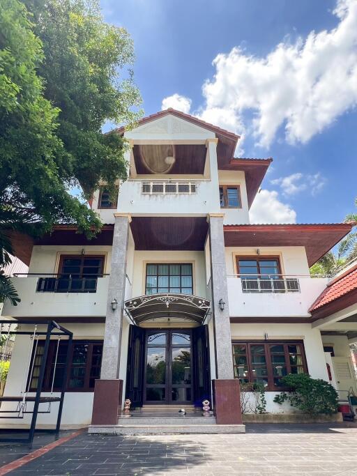 Front view of a two-story house with well-maintained exterior