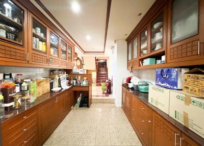 Spacious kitchen with wooden cabinets and ample storage