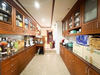 Spacious kitchen with wooden cabinets and ample storage