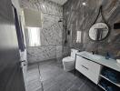 Modern bathroom with marble walls and rainfall shower