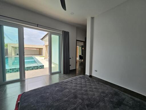 Bedroom with pool view