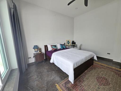 Bedroom with natural light and modern decor