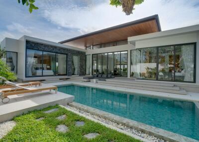 Modern house with pool and lounge area