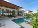 Modern villa with outdoor pool and patio area