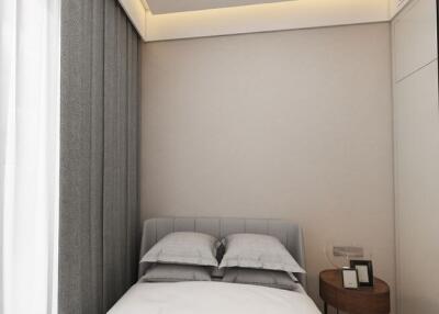 Small, modern bedroom with grey accent wall