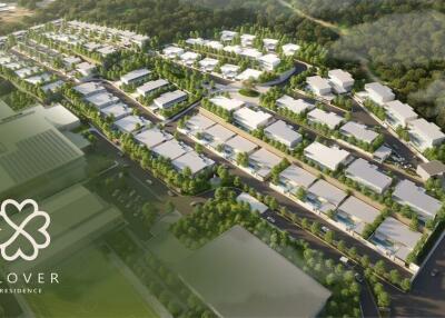 Aerial view of Clover Residence showing a planned community with multiple buildings, roads, and green spaces.