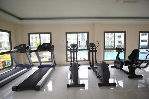 A well-equipped fitness center with treadmills, exercise bikes, and other fitness equipment.