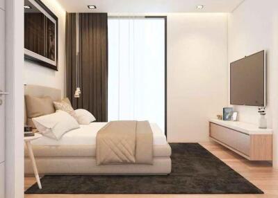 Modern, well-lit bedroom with contemporary furnishings