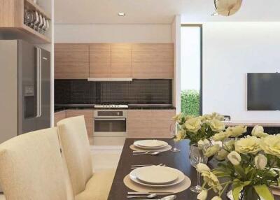 Modern kitchen and dining area with appliances and dining table set