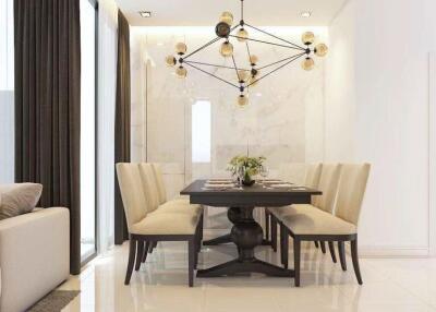 Modern dining room with a stylish chandelier