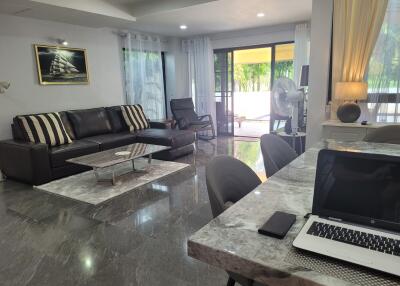 Spacious and modern living room with large windows