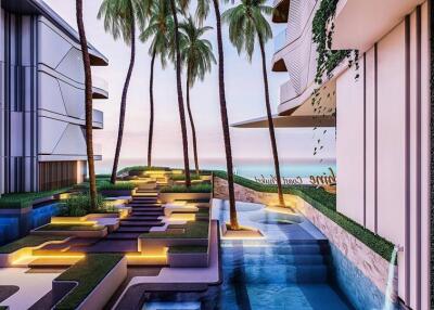 Modern residential building with palm trees, water features, and artistic landscape design