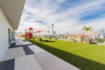 Rooftop terrace with playground and city view