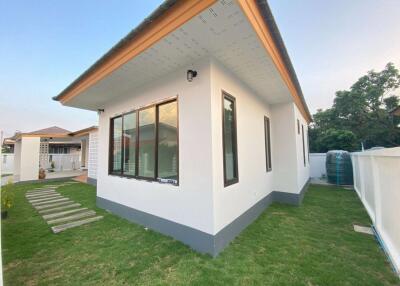 Single-story modern minimalist-style house with 3 bedrooms and 2 bathrooms.