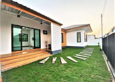 Single-story modern minimalist-style house with 3 bedrooms and 2 bathrooms.