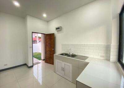 Single-story modern minimalist-style house with 3 bedrooms and 2 bathrooms.