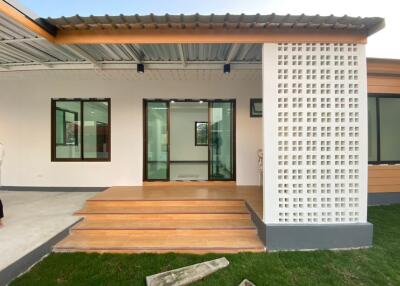 Single-story modern minimalist-style house with 3 bedrooms and 2 bathrooms.