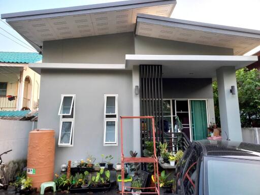 A single-story, contemporary style house with 3 bedrooms and 2 bathrooms in the Saraphi zone.