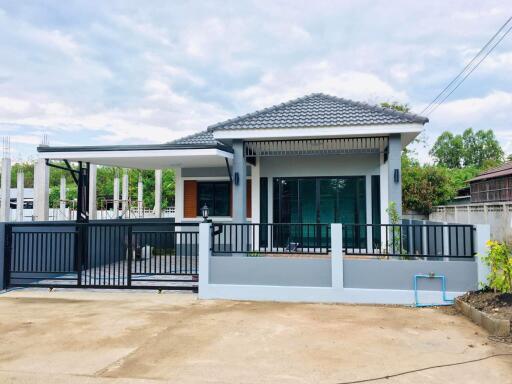 A single-story, contemporary style house with 3 bedrooms and 2 bathrooms in the San Pa Tong zone.