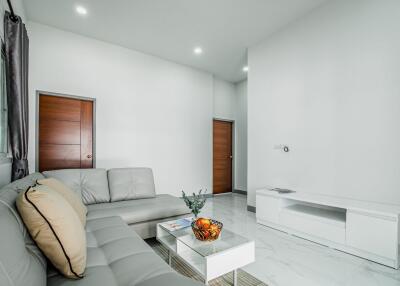 A single-story, contemporary style house with 3 bedrooms and 2 bathrooms in the Saraphi zone.