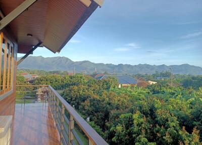 A luxurious mountain-view vacation home  2-story single house with 5 bedrooms and 5 bathrooms in Pong Tam, Chai Prakan, Chiang Mai located in a natural environment