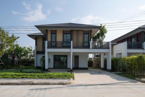 Two-story detached house in Modern Lanna style, featuring 4 bedrooms and 3 bathrooms.