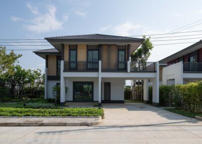 Two-story detached house in Modern Lanna style, featuring 4 bedrooms and 3 bathrooms.