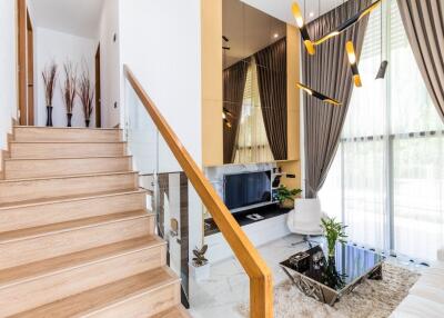 A 2-story townhome in modern style with 3 bedrooms and 3 bathrooms.