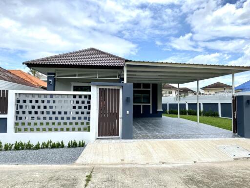 Single-story contemporary-style house with 3 bedrooms and 2 bathrooms.