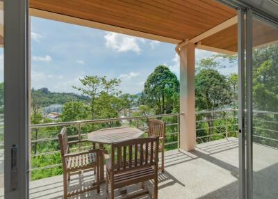 Balcony with outdoor furniture and scenic view