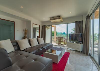 Modern living room with large sliding doors and outdoor view