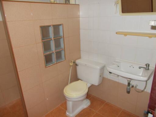 Small bathroom with toilet and sink