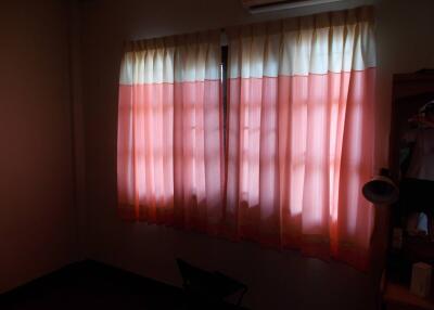 Bedroom with closed curtains