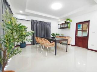 Bright dining area with table and chairs