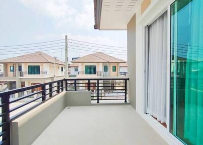 Spacious balcony with a view of neighboring houses