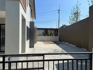 Outdoor area with driveway and gate