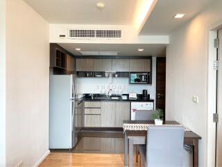 Modern kitchen interior with dining table